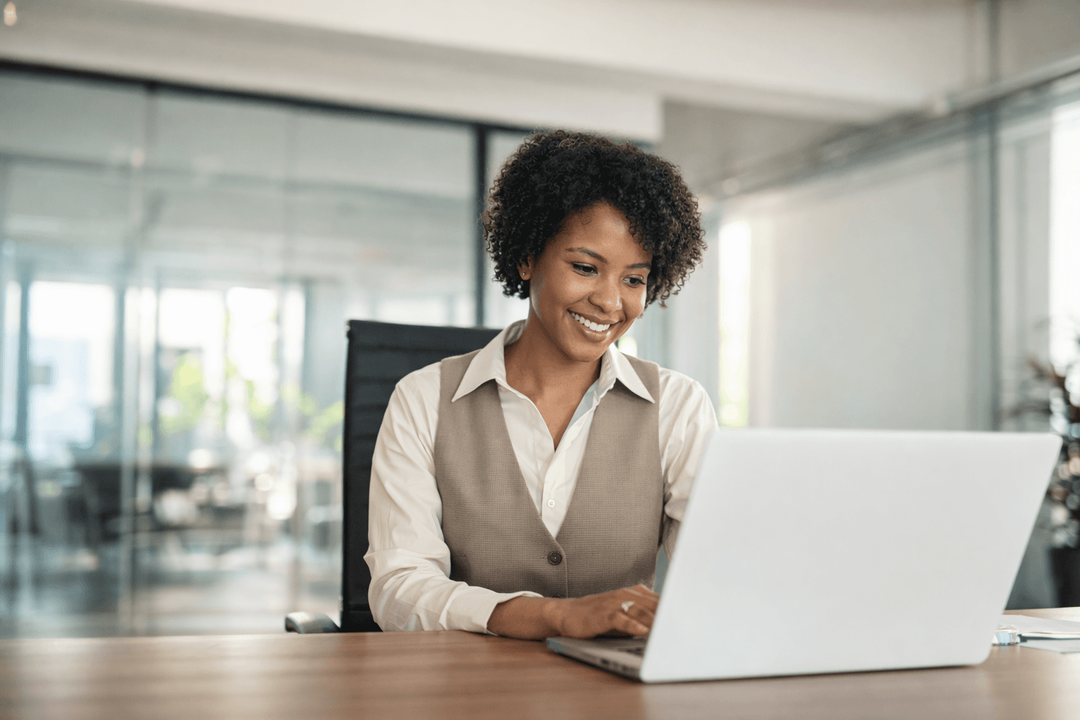 Woman purchasing on laptop